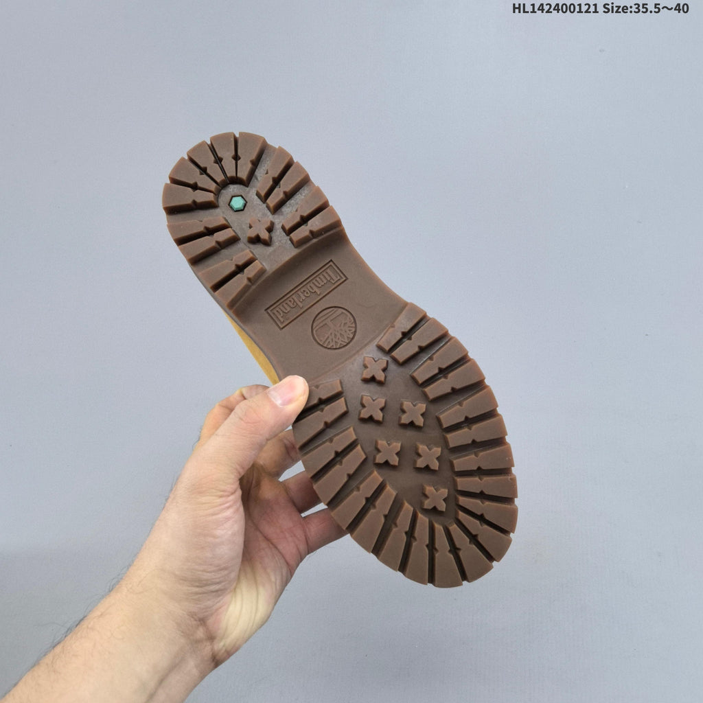 Mid-Top Lace-Up Boots in Wheat by Timberland - product image from the listing.