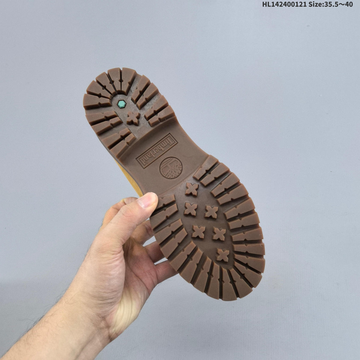 Mid-Top Lace-Up Boots in Wheat by Timberland - product image from the listing.