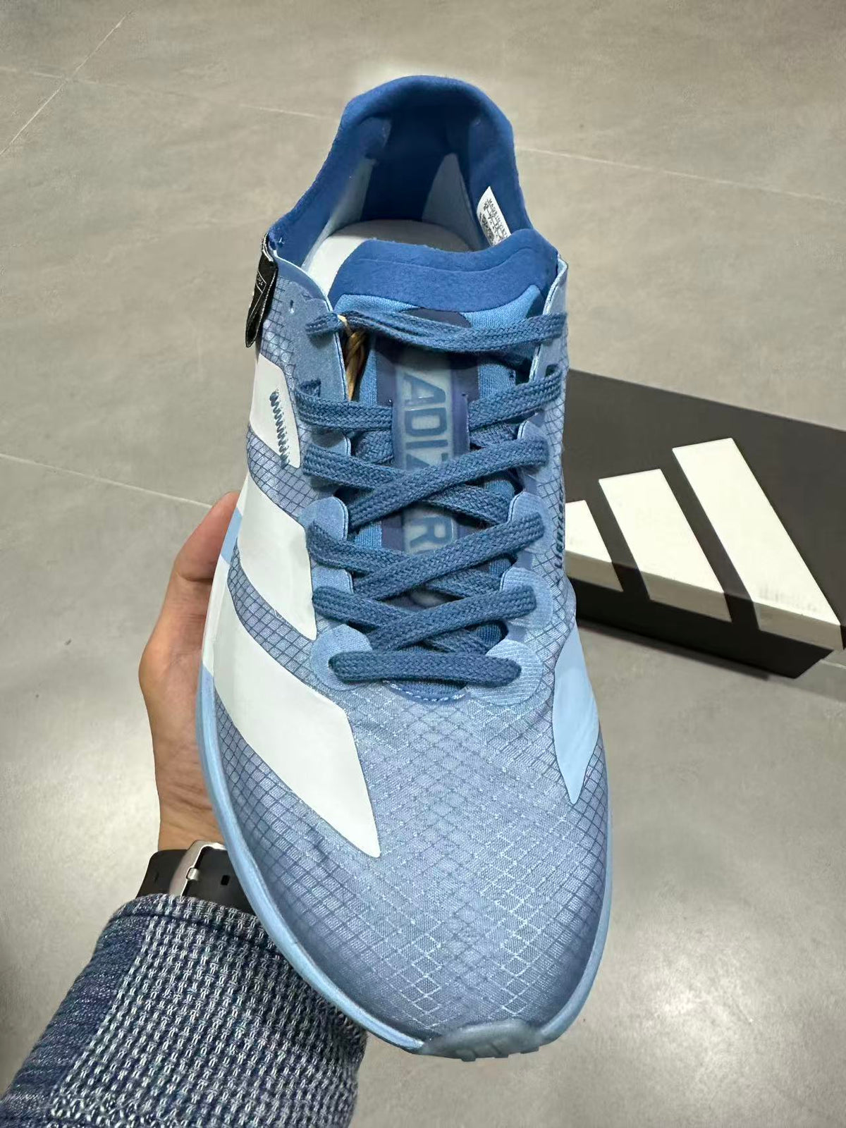 Blue Adidas Lightstrike Pro Running Shoes - product image from the listing.