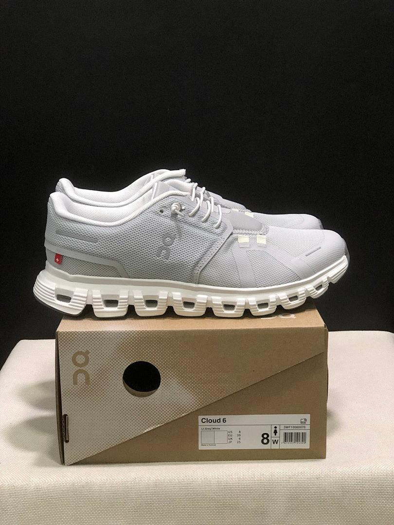 On Cloud 6 Sneakers in Gray and White - product image from the listing.