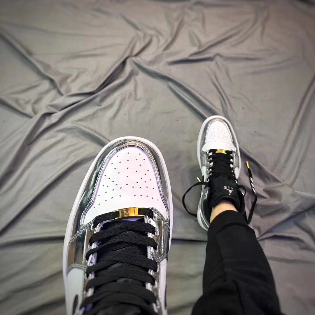 Air Jordan 1 Pass The Torch High-Top Sneakers Silver White - product image from the listing.