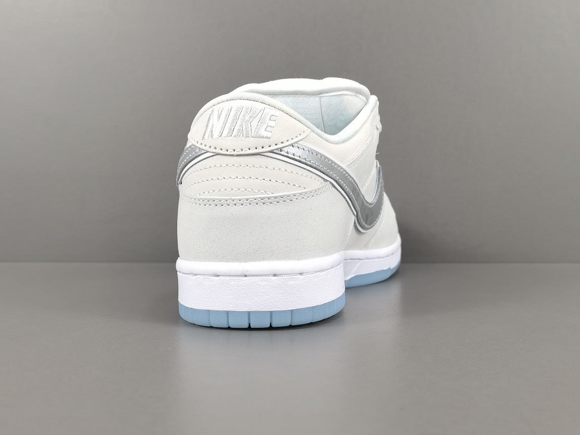 Nike Dunk Low SB Purple Lobster Sneakers in White FD8776-100 - product image from the listing.