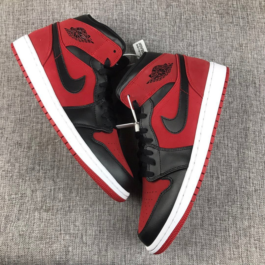 Air Jordan 1 Mid Sneakers in Red, in Black and White - product image from the listing.
