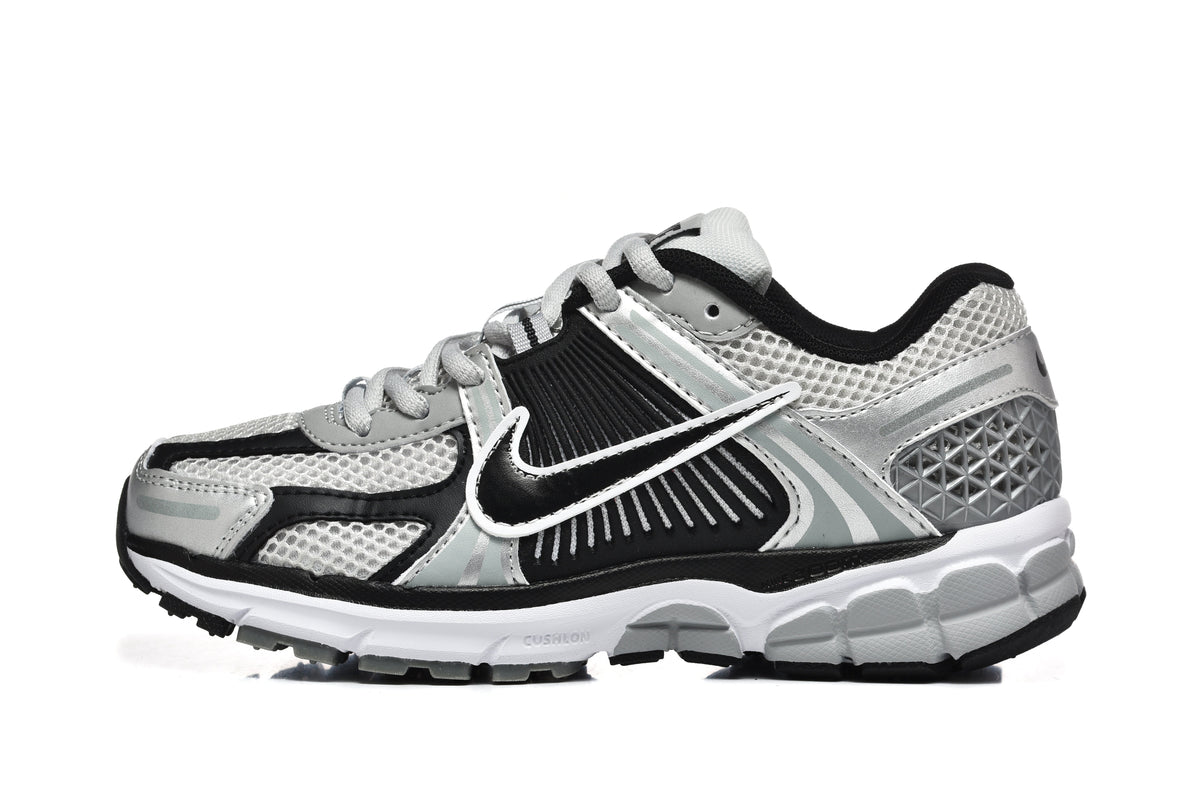 Nike Silver and Black Mesh Trainers - product image from the listing.