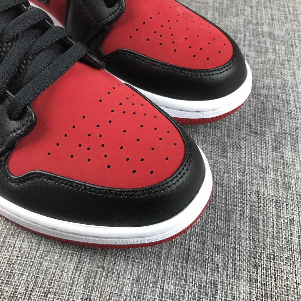 Air Jordan 1 Mid Sneakers in Red, in Black and White - product image from the listing.