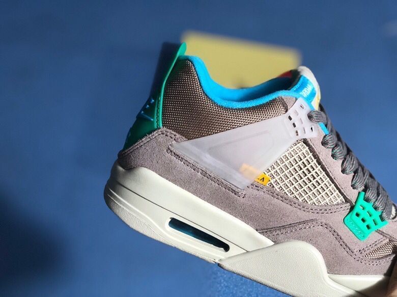 Air Jordan 4 Retro Gray Teal Sneakers - product image from the listing.