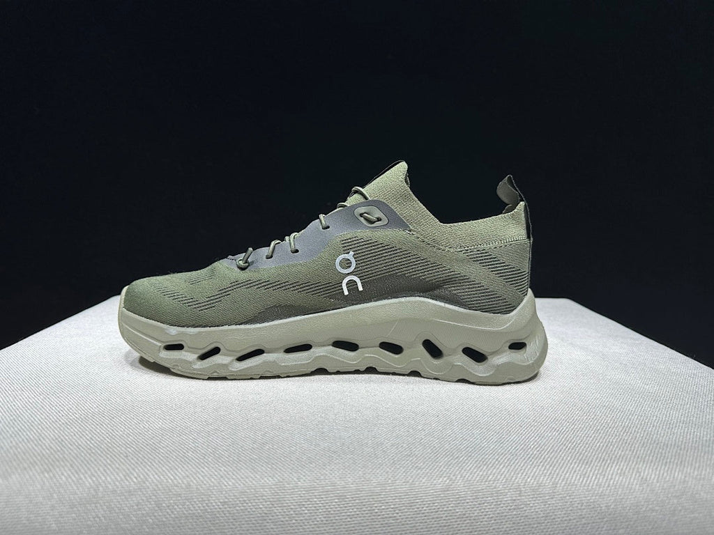 On Cloudtilt Loewe Sneakers in Khaki Green - product image from the listing.
