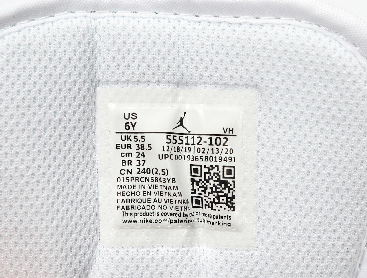 Jordan 1 Mid Sneakers in White Pink Aqua 555112-102 - product image from the listing.