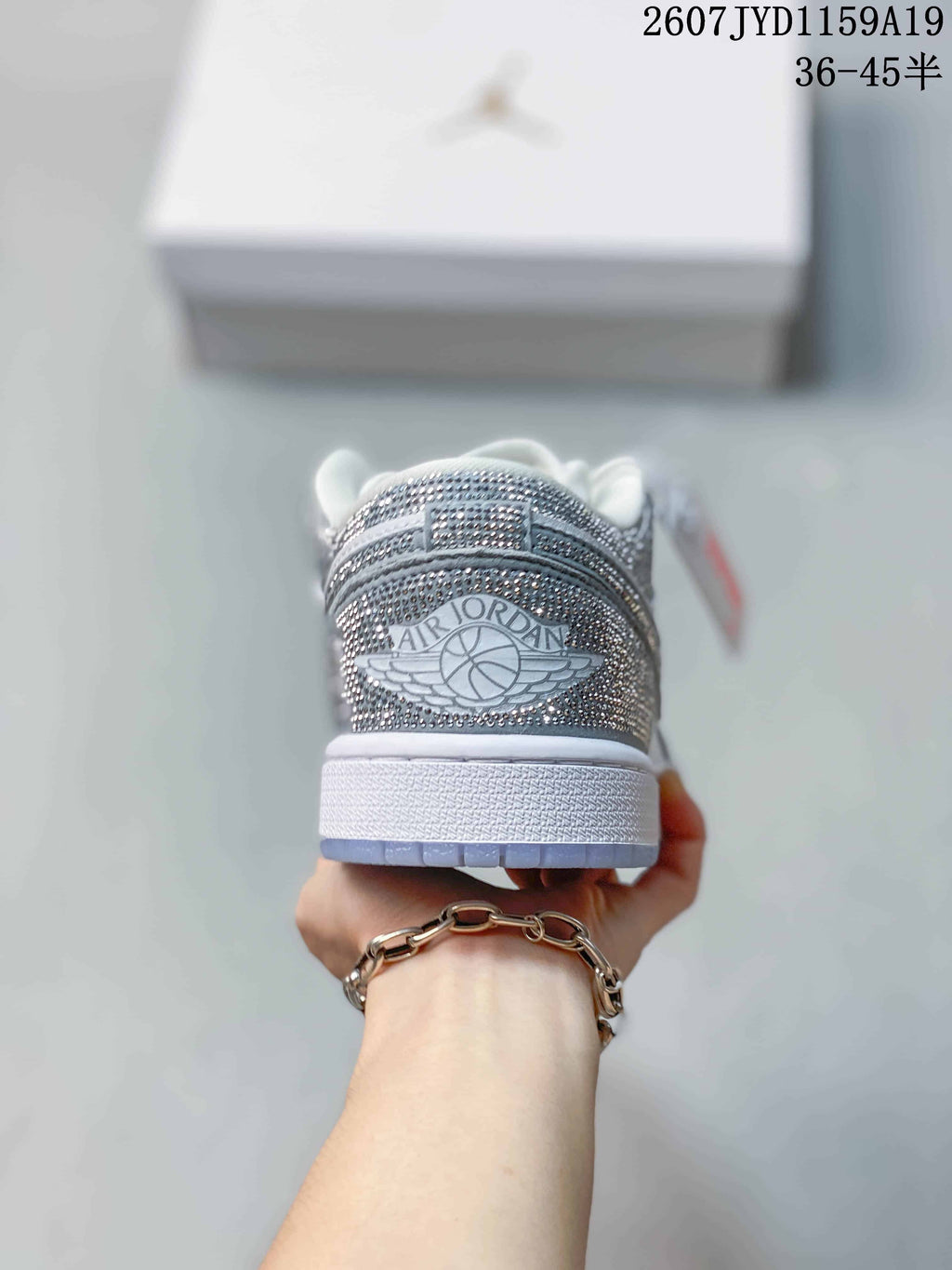 Air Jordan 1 Low Sneakers White Silver 2607JYD1159A19 - product image from the listing.