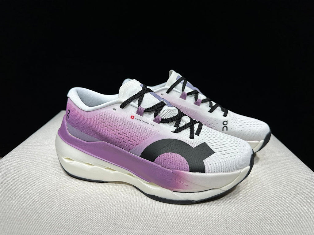 On Cloudboom Max Running Sneakers in White Purple - product image from the listing.