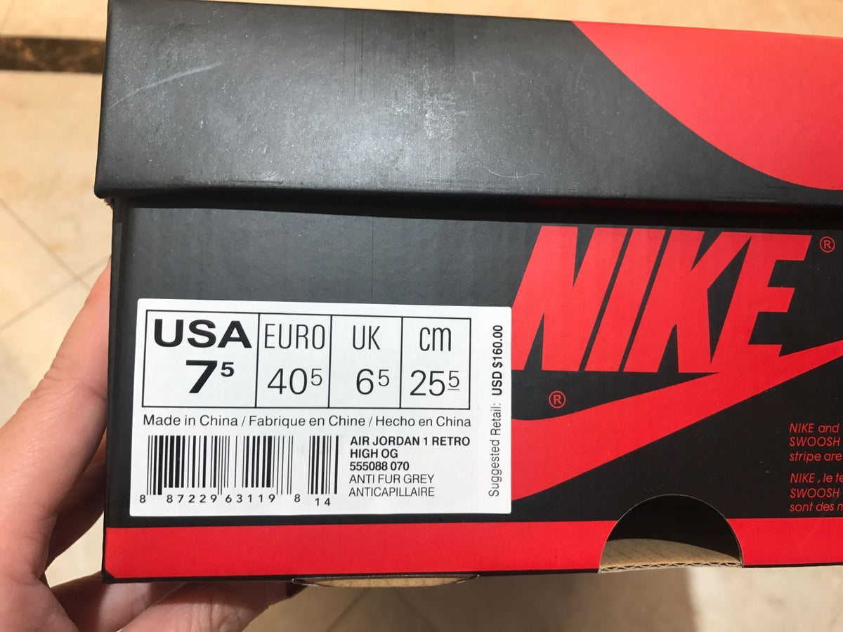 Jordan 1 Retro High OG High-Top Sneakers in Grey Green - product image from the listing.