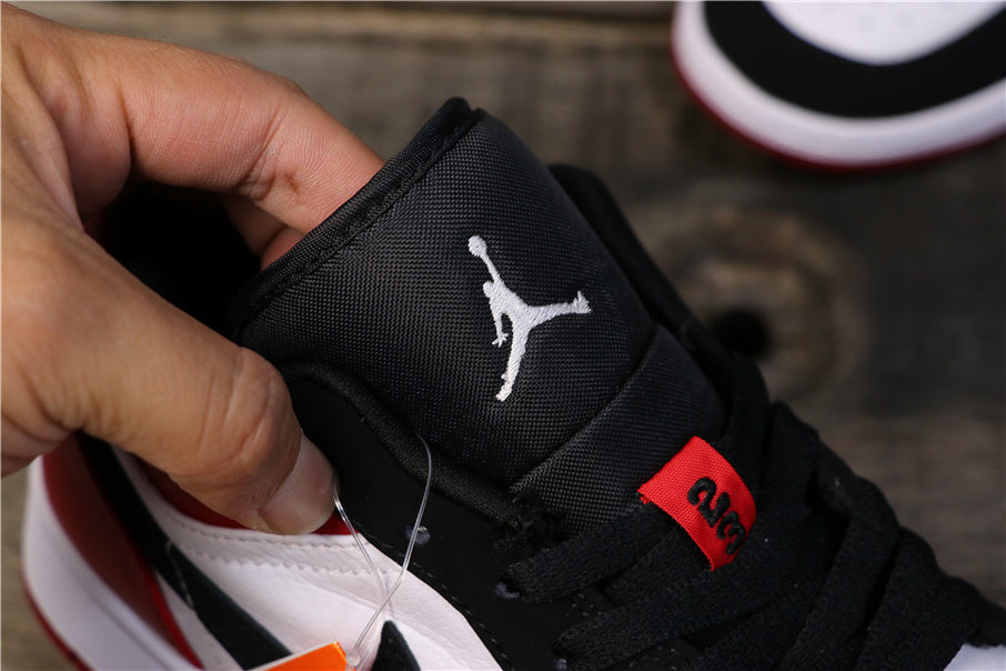 Air Jordan 1 Low Black Toe Red, Sneakers in White and Black - product image from the listing.