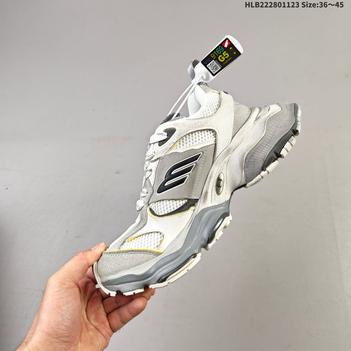 Balenciaga Monday Low-Top Sneakers in White, in Gray and Yellow - product image from the listing.