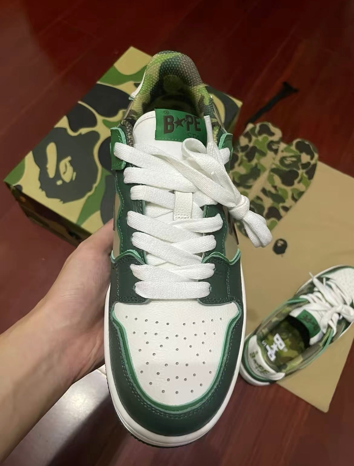BAPE SK8 STA Low-Cut Sneakers in Green Camo - product image from the listing.