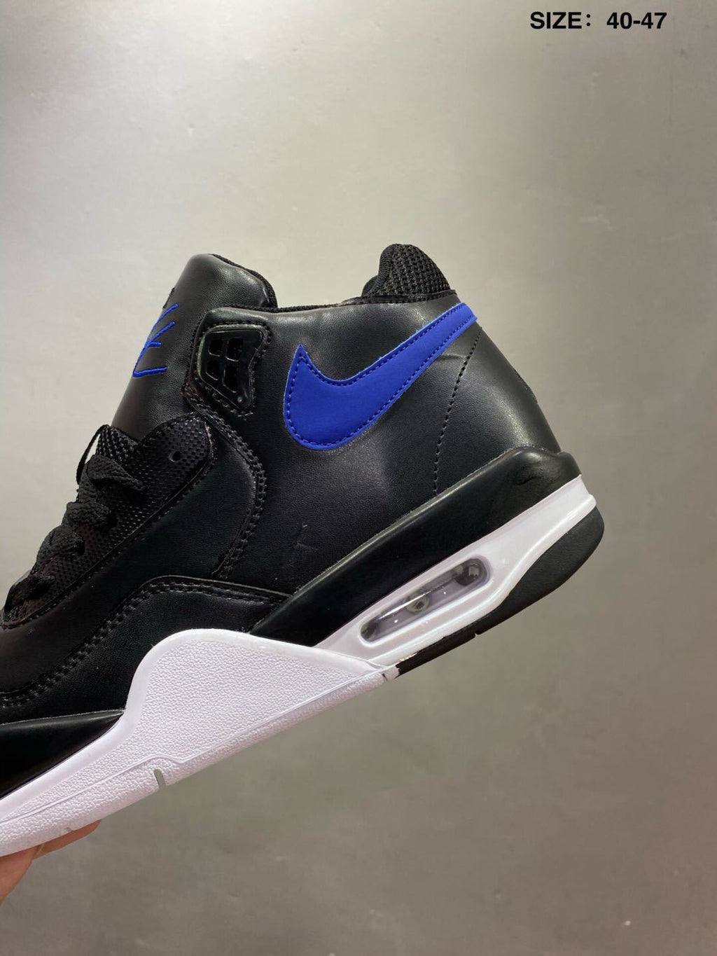 Nike Air Flight 89 Sneakers in Black and Royal Blue - product image from the listing.
