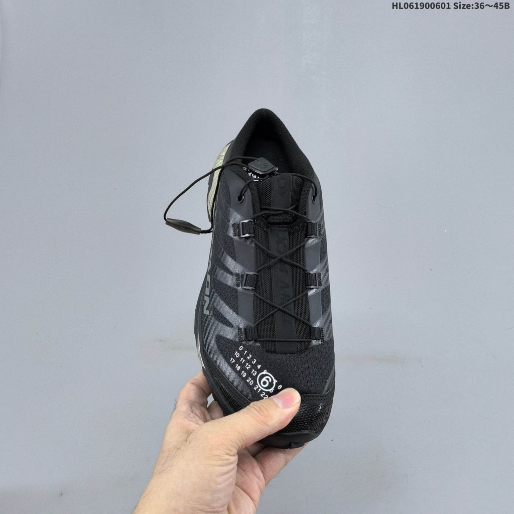 Black and Silver Salomon XT-4 Mule Sneakers - product image from the listing.