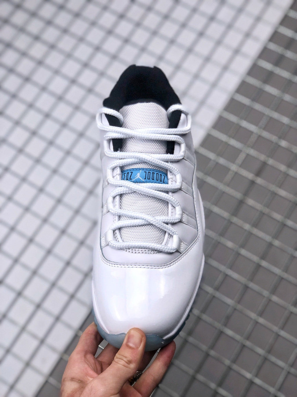 Air Jordan 11 Low Legend Blue Sneakers AV2187-117 - product image from the listing.