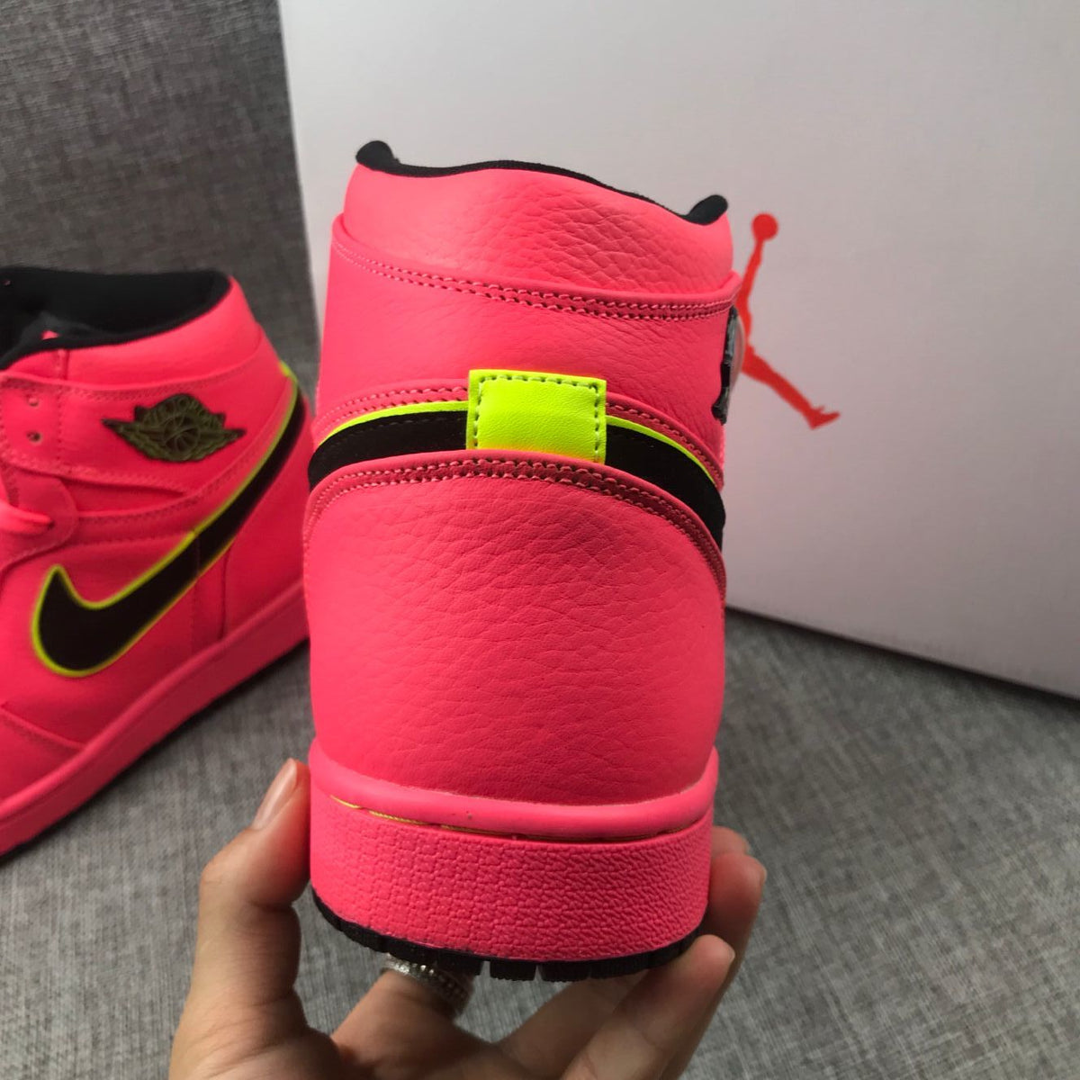 Air Jordan 1 Mid Sneakers in Pink Black Volt AQ9131-600 - product image from the listing.