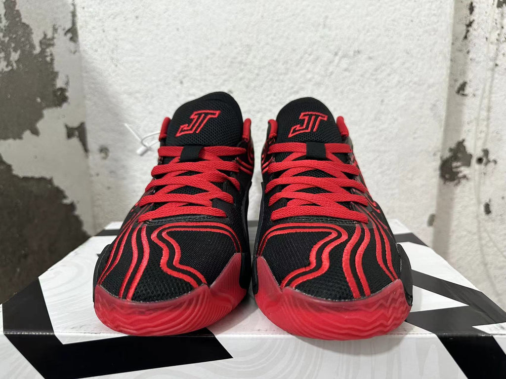Jordan Tatum 1 Basketball Shoes in Black and Red - product image from the listing.