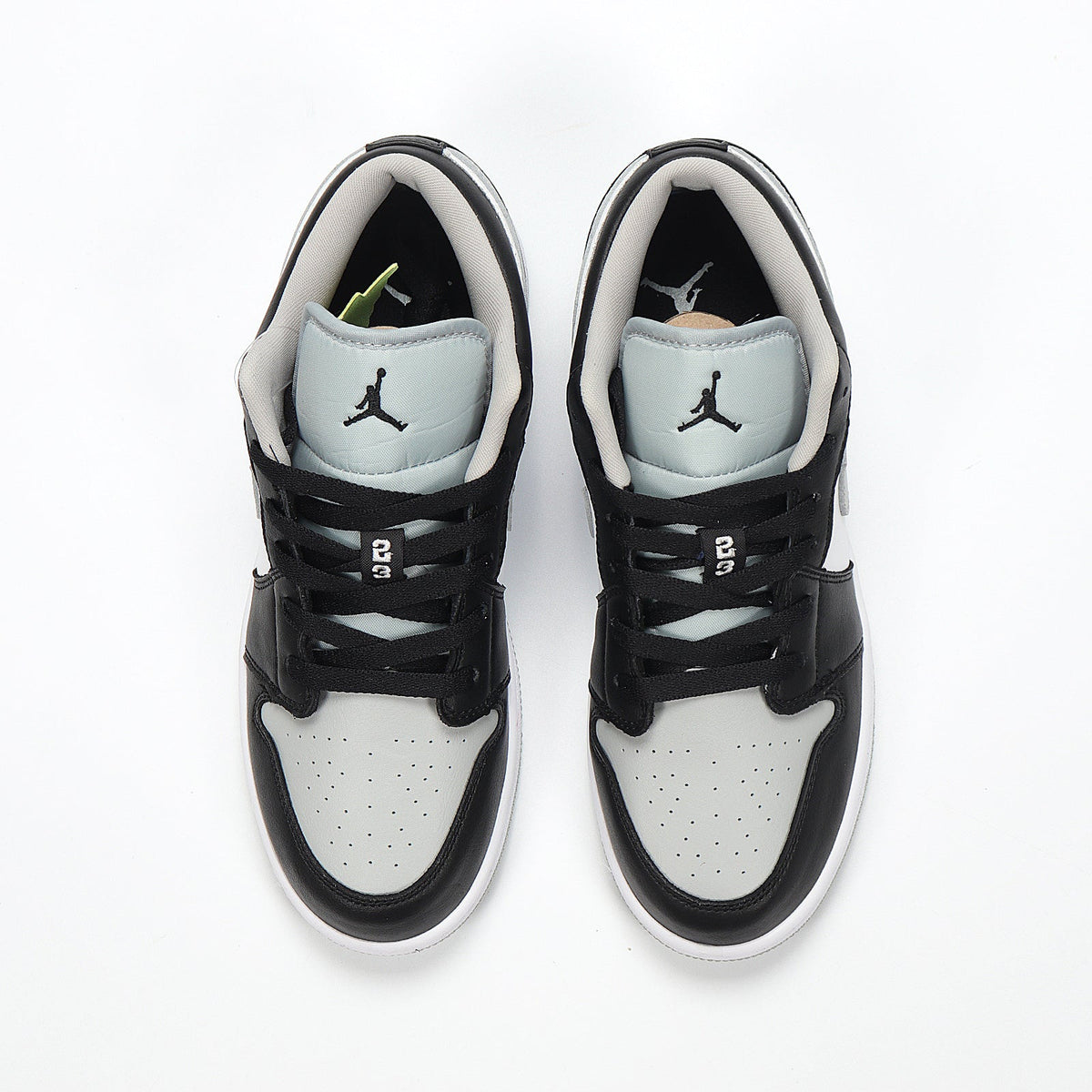 Jordan 1 Low Sneakers in Cool Grey 553560-039 - product image from the listing.