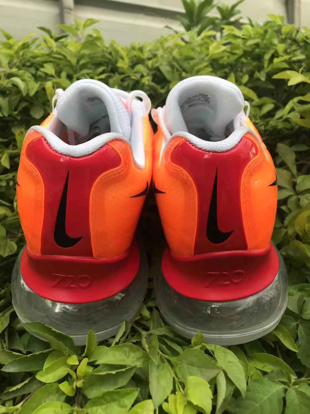 Orange and Red Nike Air Max 720 Sneakers - product image from the listing.