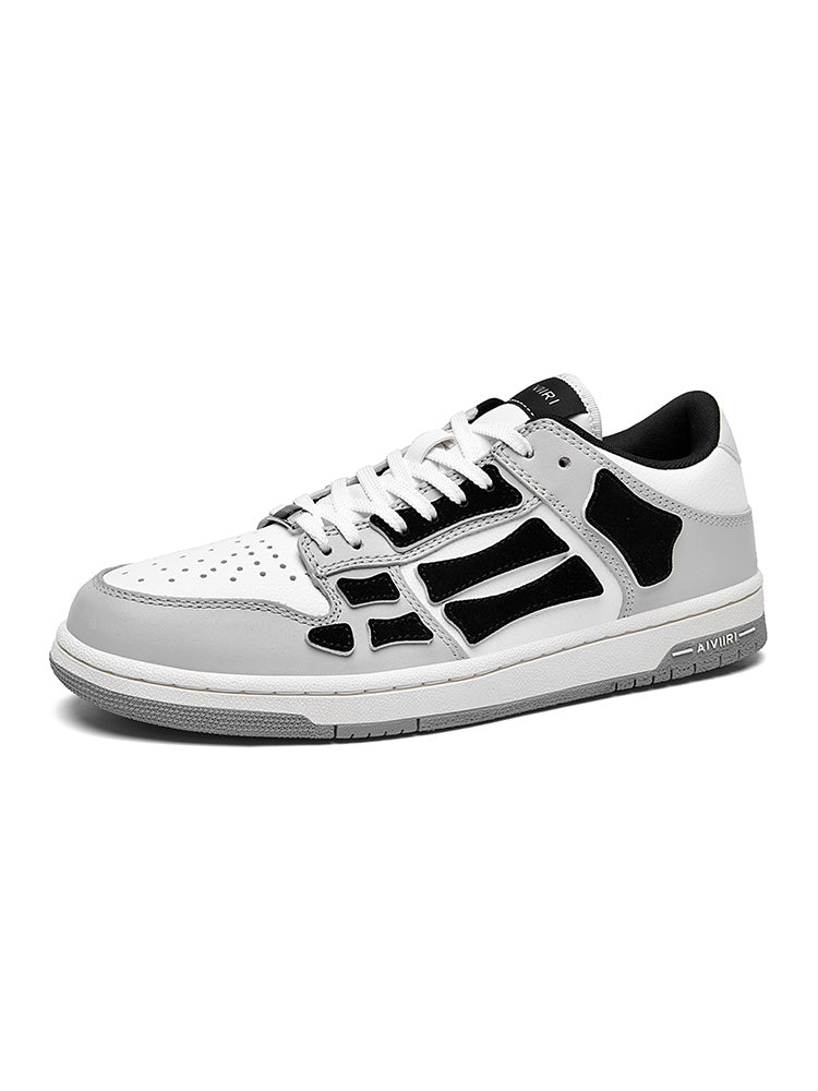 AMIRI Gray and White Low-Cut Sneakers with Black Accents - product image from the listing.