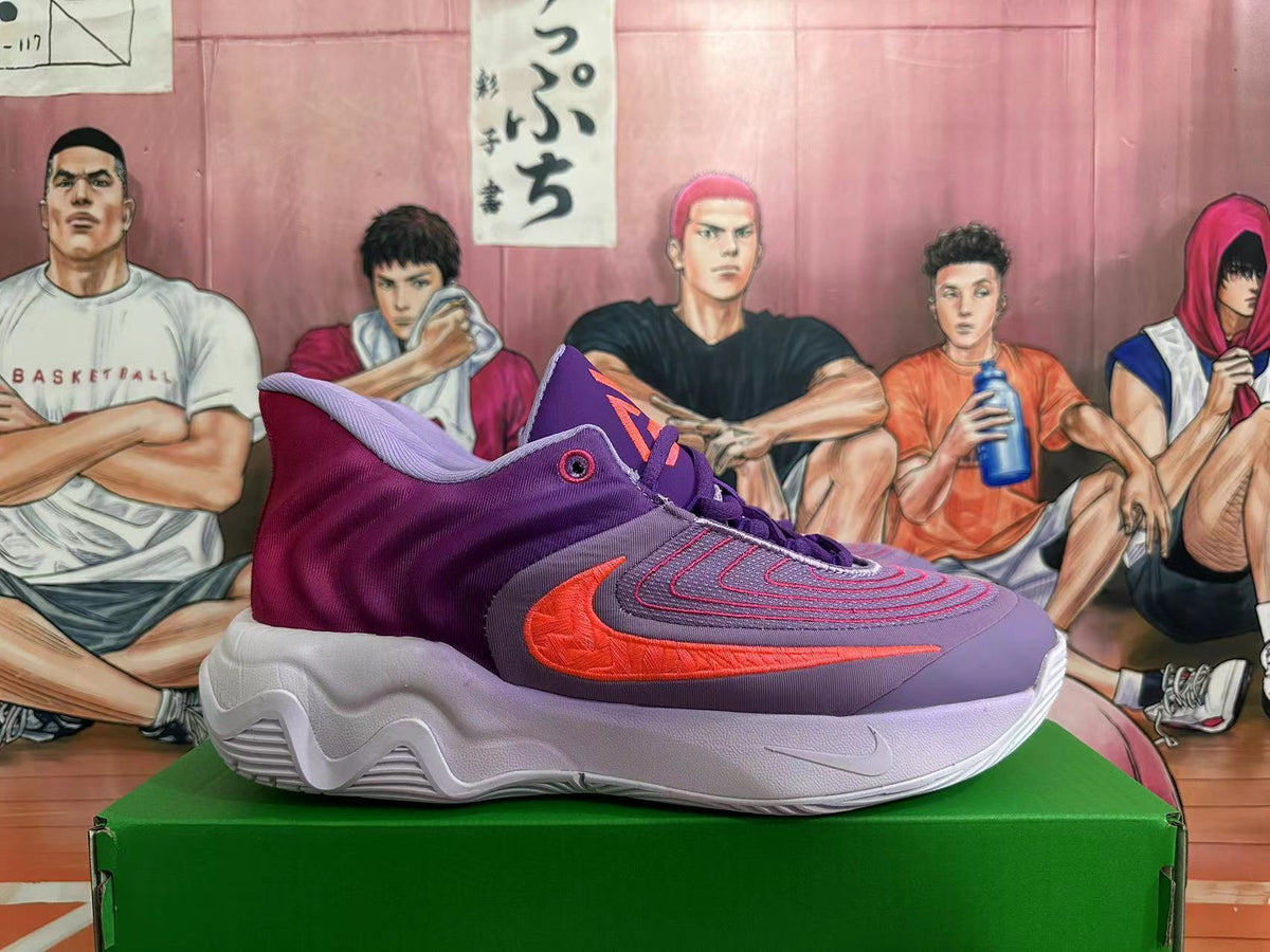 Purple and Burgundy Nike Basketball Shoes - product image from the listing.