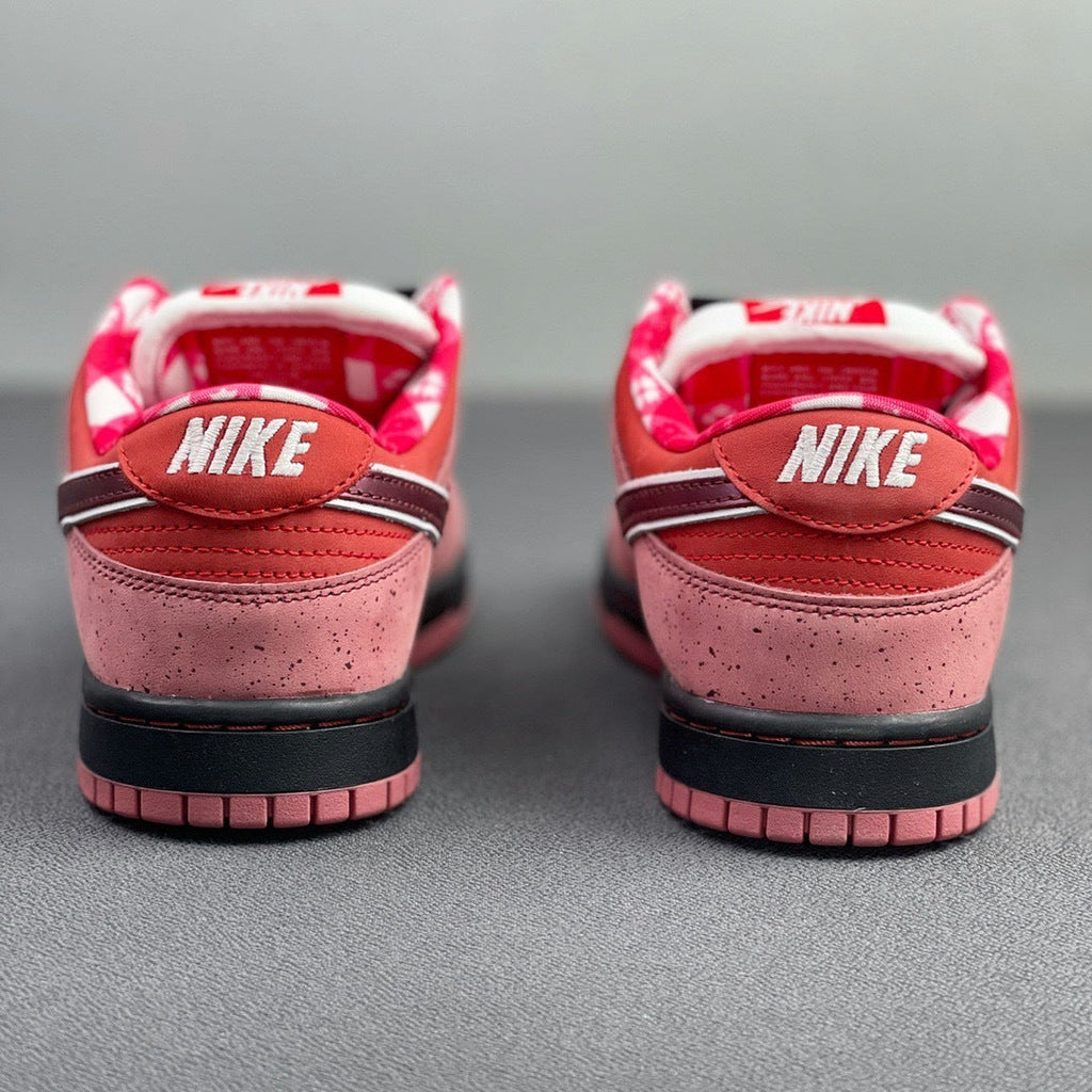 SB Dunk Low Concepts Red Lobster 313170-661 by Nike - product image from the listing.