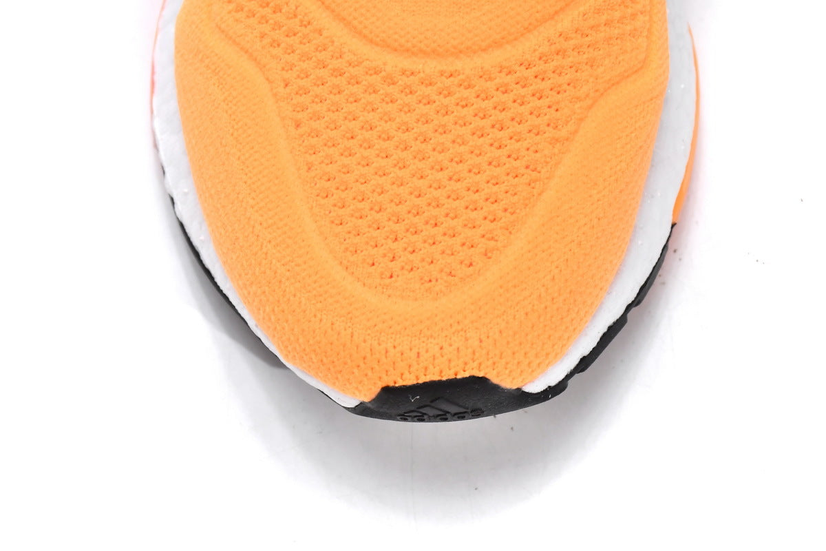 Adidas Ultra Boost 22 Running Shoes in Orange HR1029 - product image from the listing.