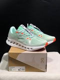 Pale Green and White On Cloudsurfer Sneakers - product image from the listing.