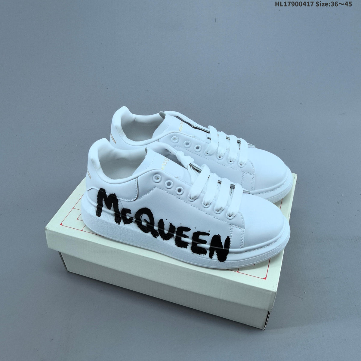 Alexander McQueen Oversized Low-Cut Sneakers with Logo - product image from the listing.