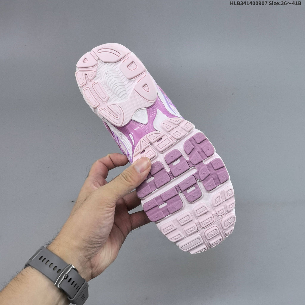White and Purple Nike Air Max Moto Sneakers - product image from the listing.
