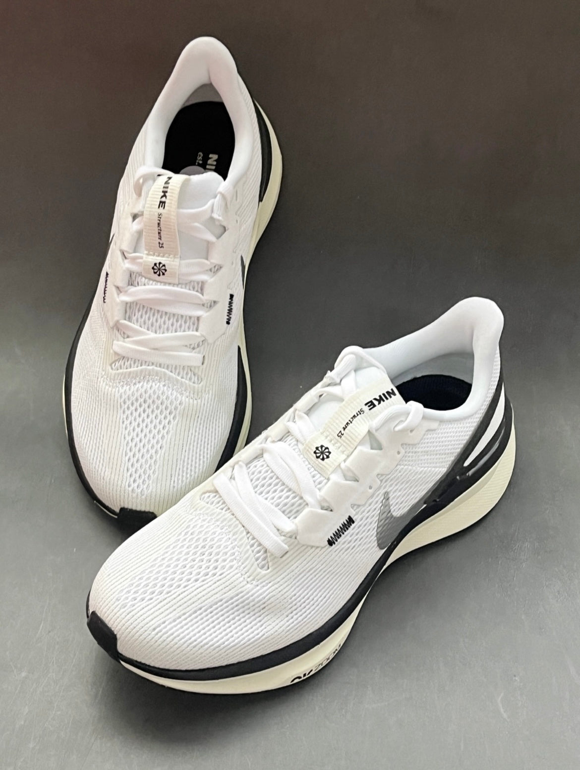 Nike Structure 25 Road Running Shoes in White Black DJ7884-104 - product image from the listing.