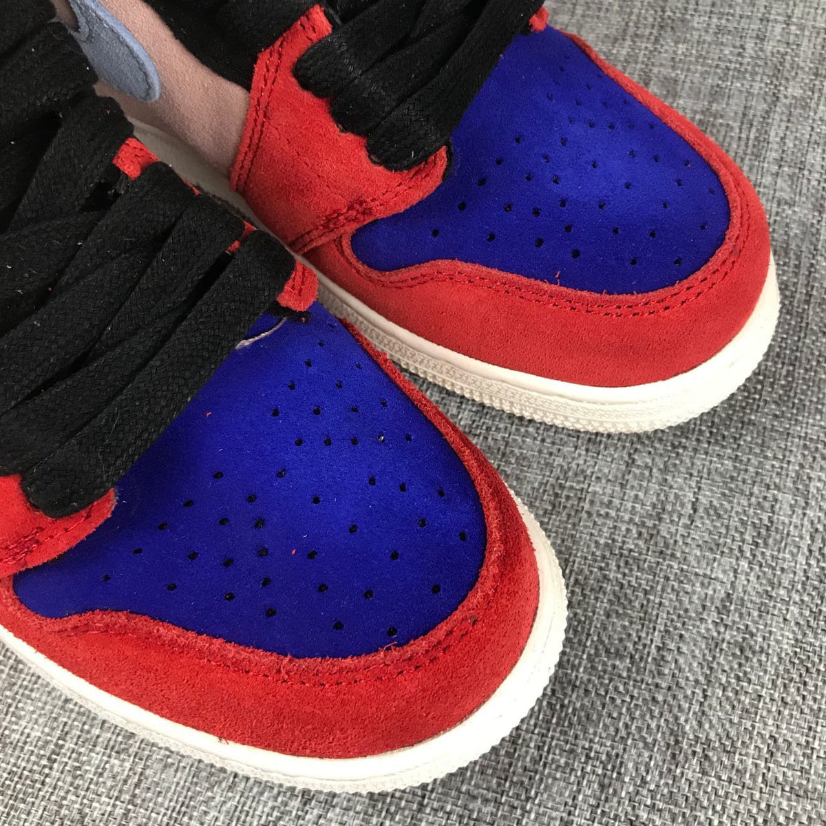 Jordan 1 High Christmas Sneakers in Red Multicolor - product image from the listing.