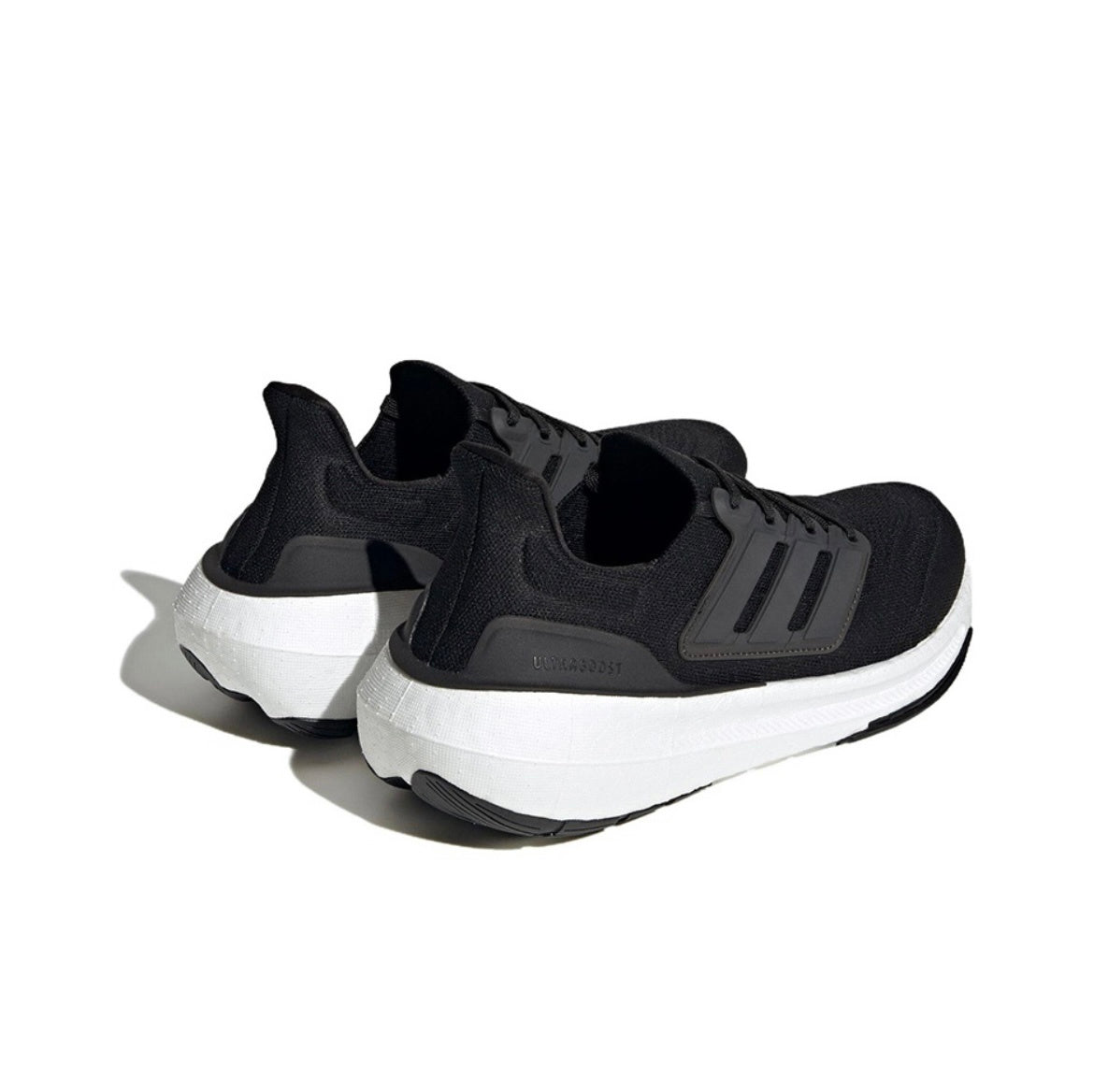adidas Ultraboost 23 Light Running Shoes in Black White GY9351 - product image from the listing.
