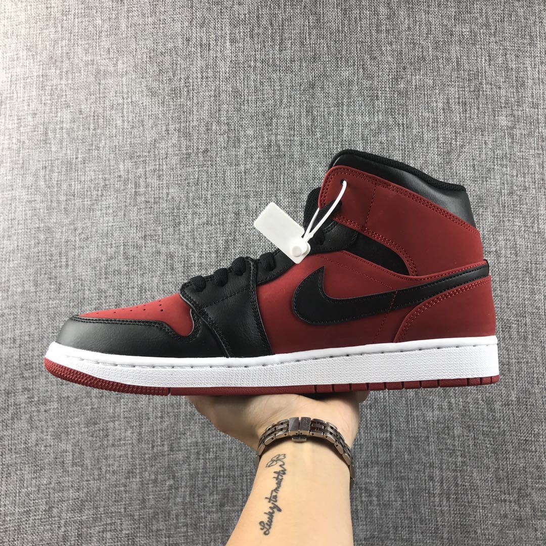 Air Jordan 1 Mid Sneakers in Red, in Black and White - product image from the listing.