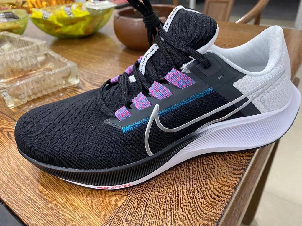 Nike Air Zoom Pegasus 38 Running Shoes in Black White CW7356-003 - product image from the listing.