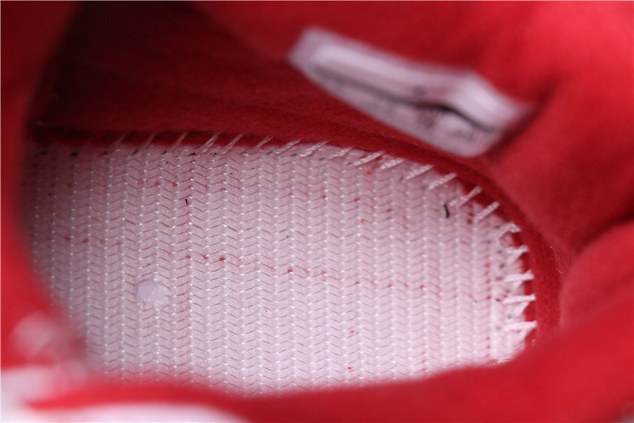 Air Jordan 4 Retro White Red Black Sneakers - product image from the listing.