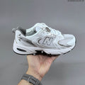 New Balance MR530AD Retro Mesh Sneakers in White Silver - product image from the listing.