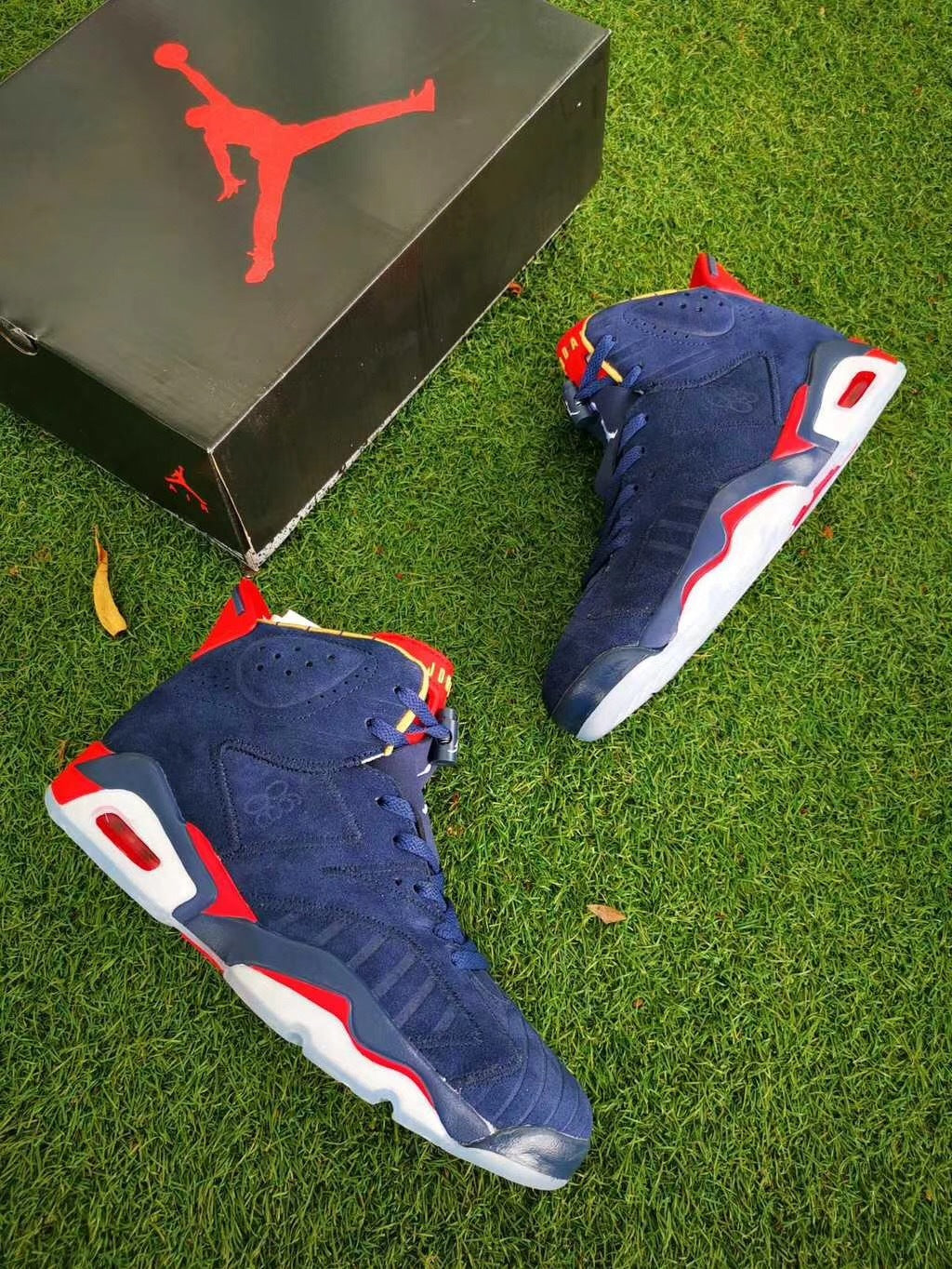 Air Jordan 6 Charity Sneakers in Navy, Red and White - product image from the listing.