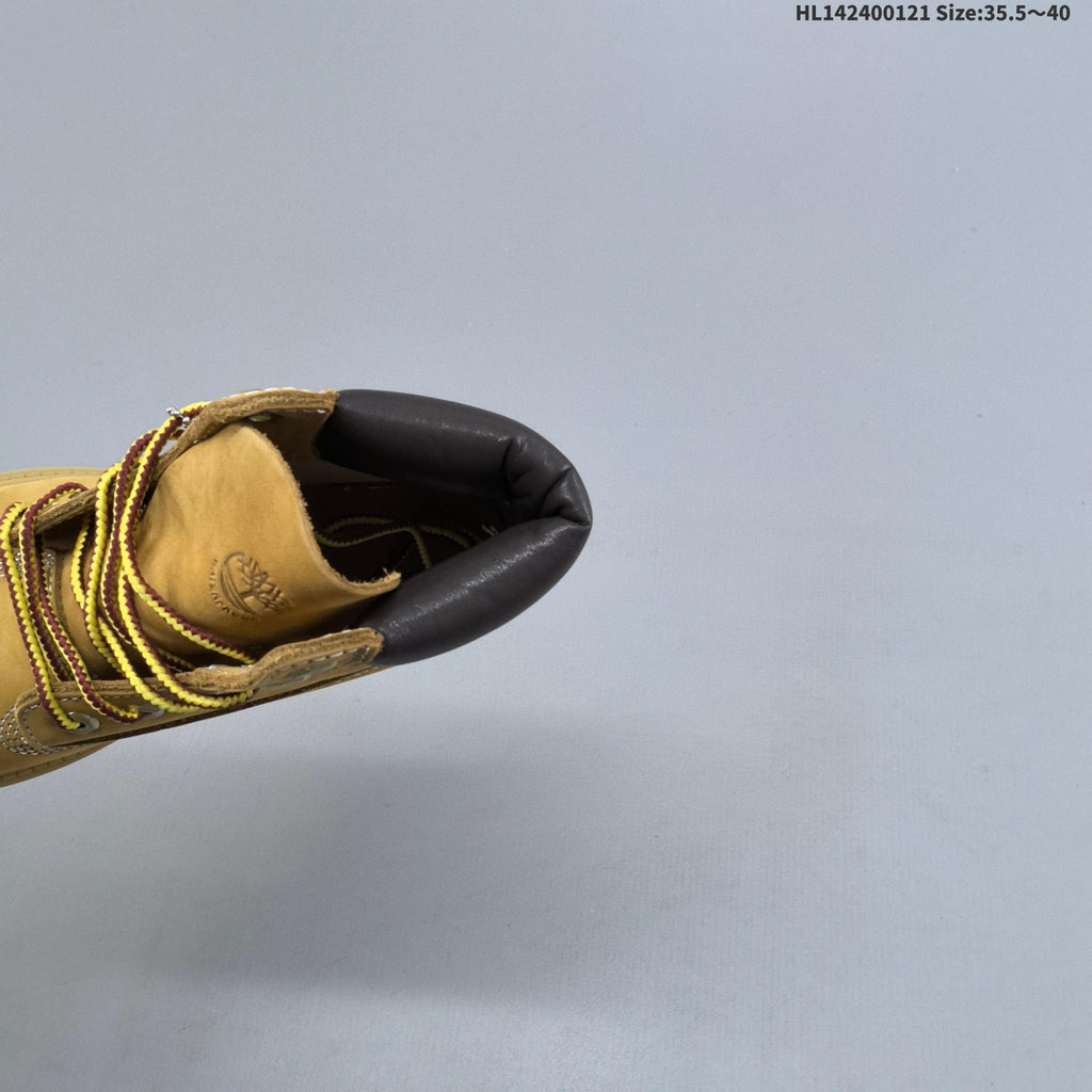 Mid-Top Lace-Up Boots in Wheat by Timberland - product image from the listing.
