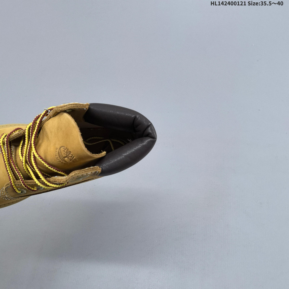 Mid-Top Lace-Up Boots in Wheat by Timberland - product image from the listing.