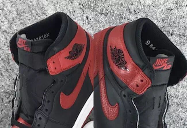 Air Jordan 1 High Sneakers in Black and Red - product image from the listing.