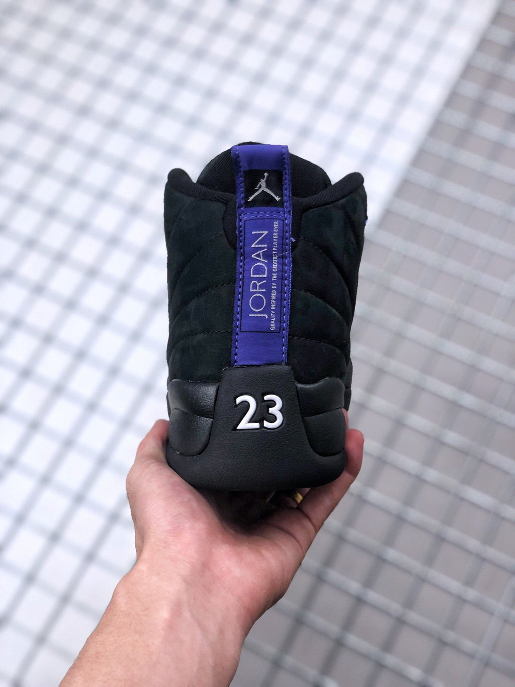 Air Jordan 12 Dark Concord Sneakers CT8013-005 - product image from the listing.