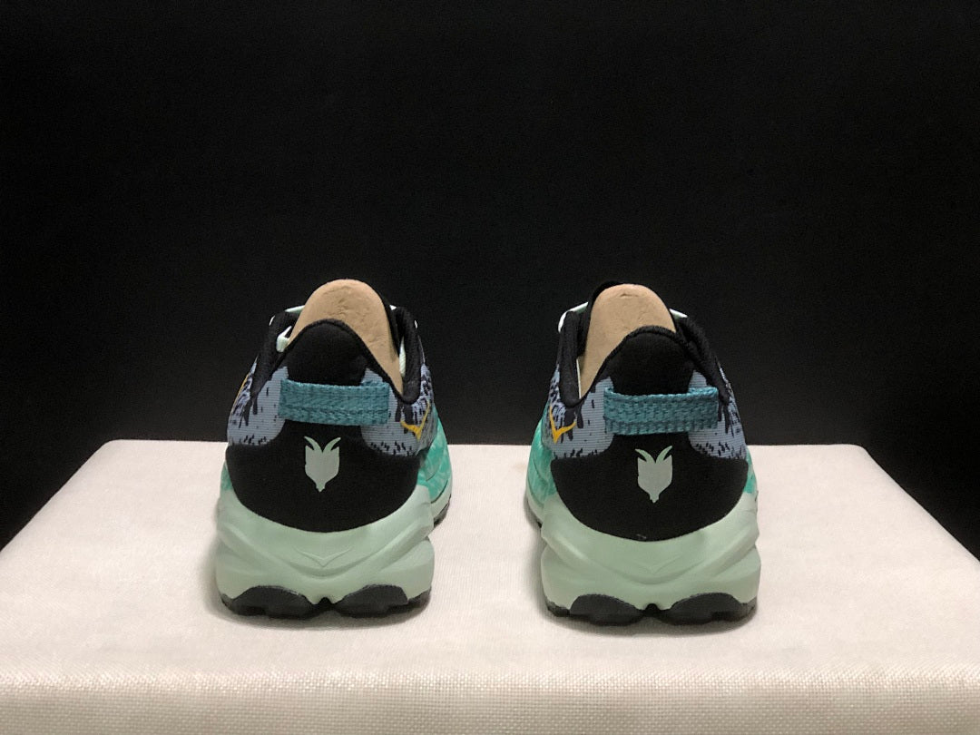 HOKA Speedgoat 6 Trail Running Shoes, in Gray and Teal - product image from the listing.