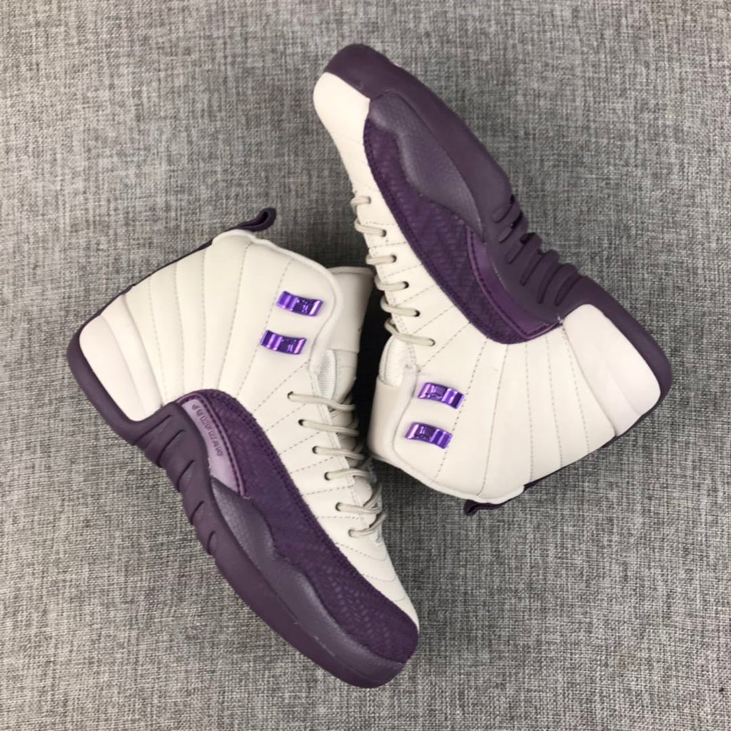 Air Jordan 12 White Purple Sneakers 510815-001 - product image from the listing.