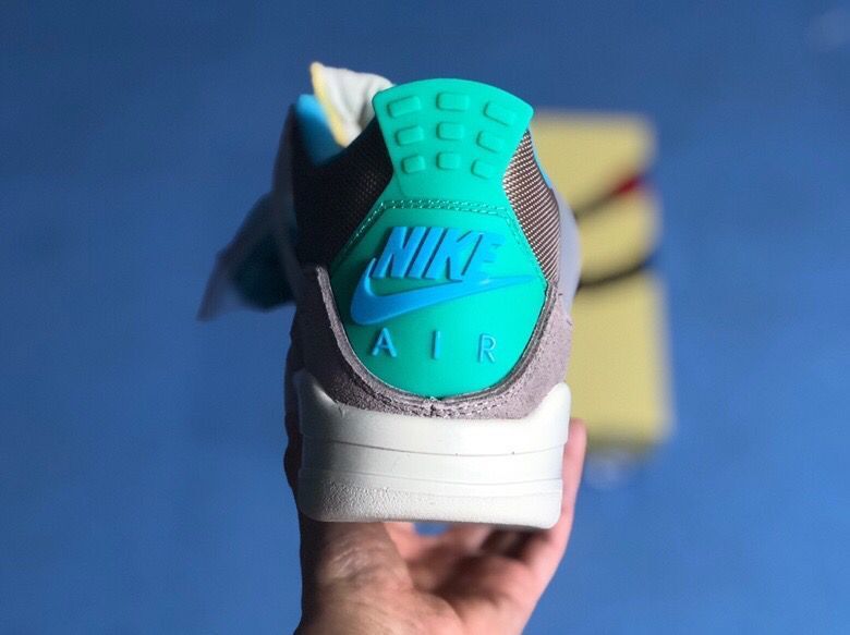 Air Jordan 4 Retro Gray Teal Sneakers - product image from the listing.