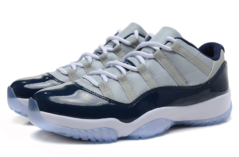 Air Jordan 11 Retro Low Sneakers, White and Navy - product image from the listing.