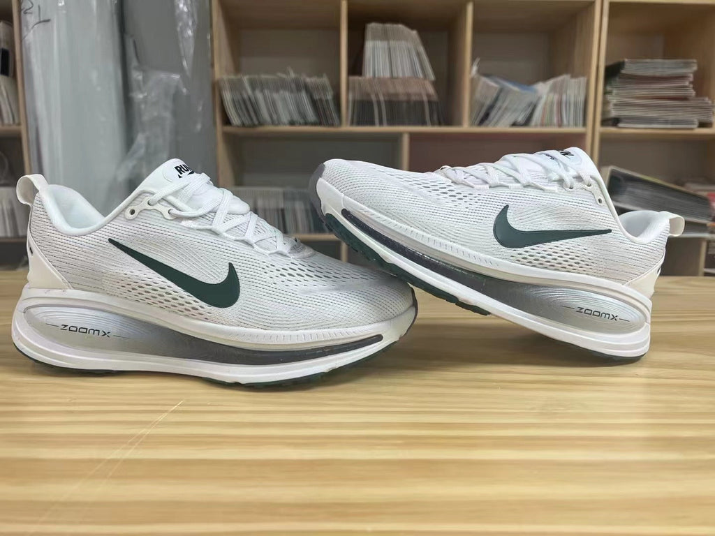 Nike Vomero 18 Shoes for Running, White with Dark Swoosh - product image from the listing.
