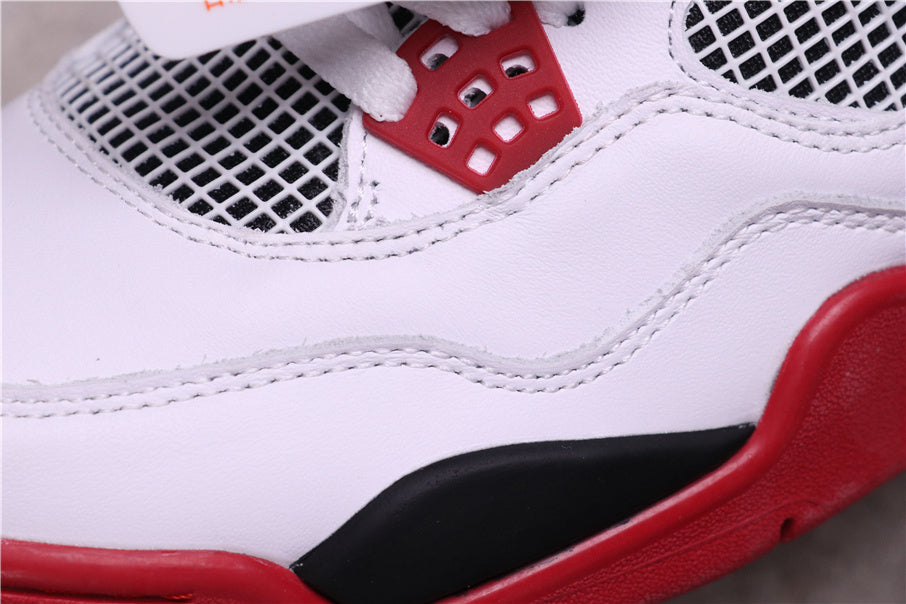 Air Jordan 4 Retro White Red Black Sneakers - product image from the listing.